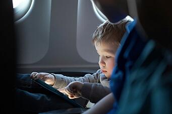 toddler_traveling_ plane