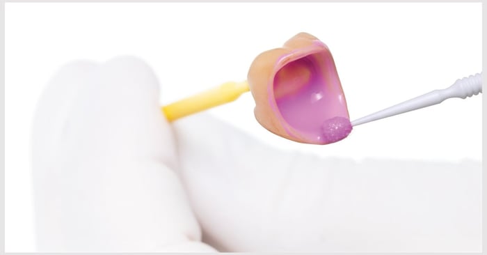Pre-treatment of indirect restorations prior to cementation