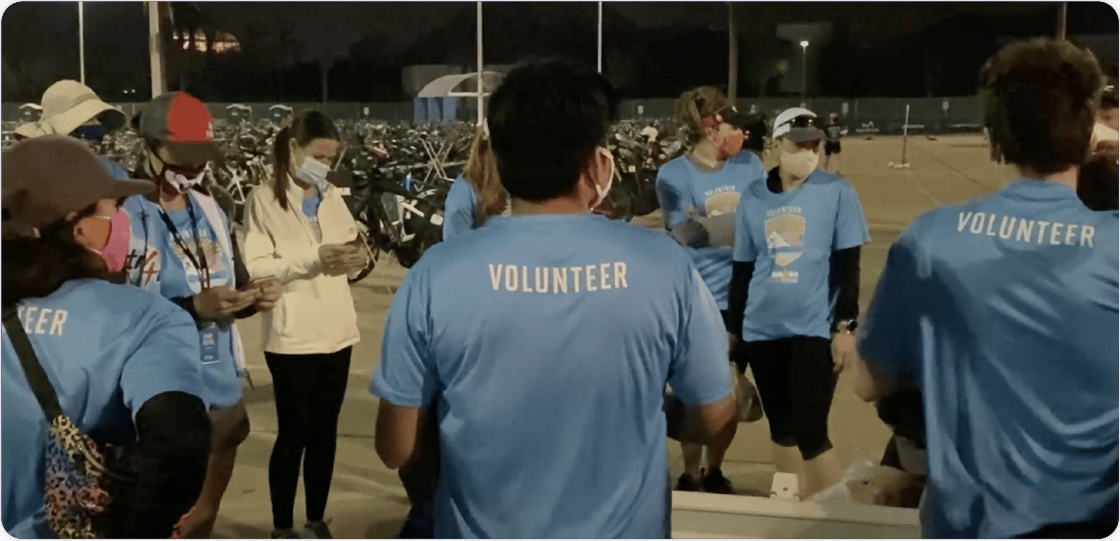 A volunteer huddle at IRONMAN 70.3 Texas.