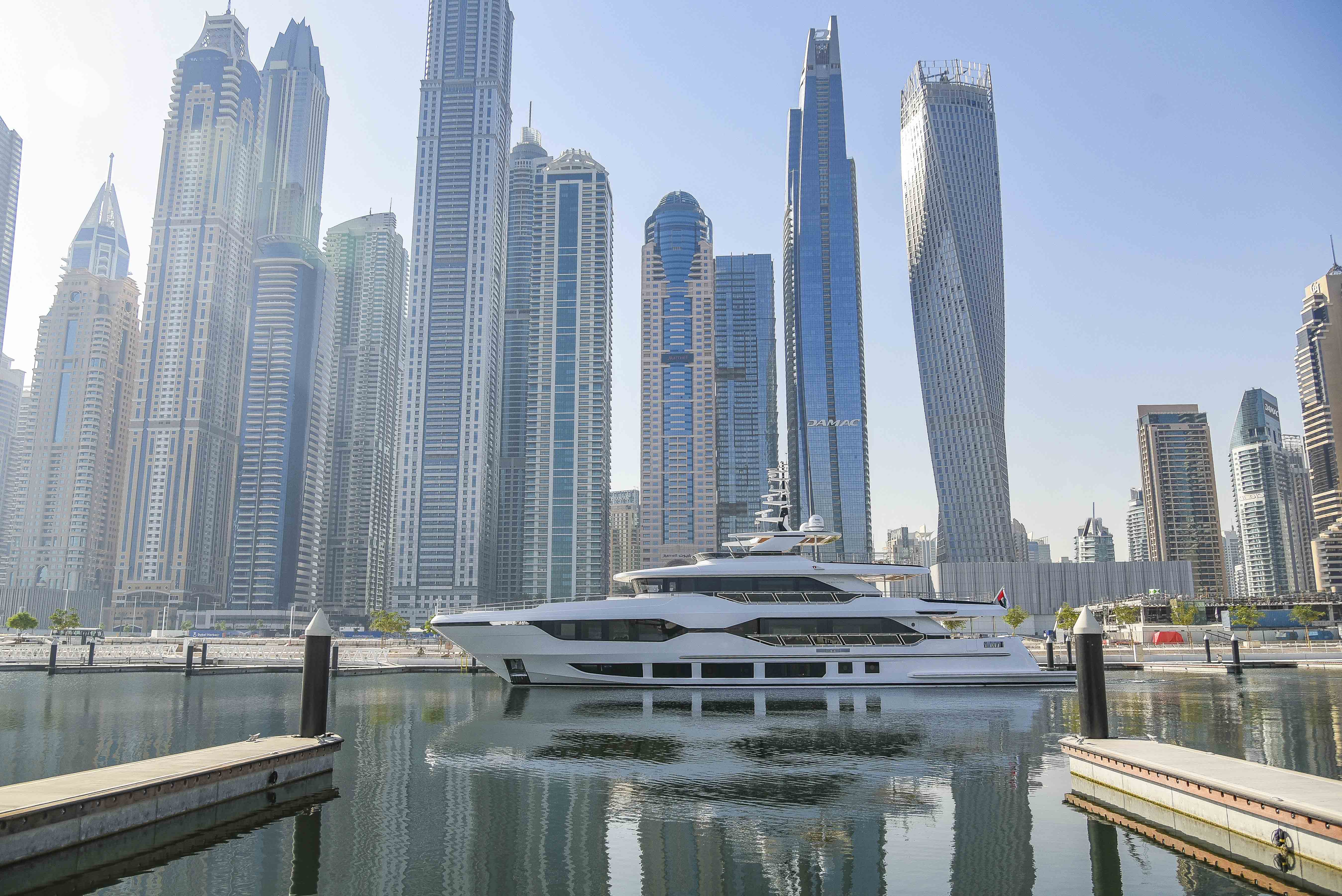 Majesty 120 making its way through its berth in Dubai Harbour Marina (1)