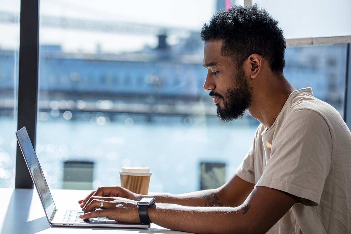 Man at desk using Autodesk