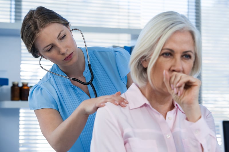 Woman coughing