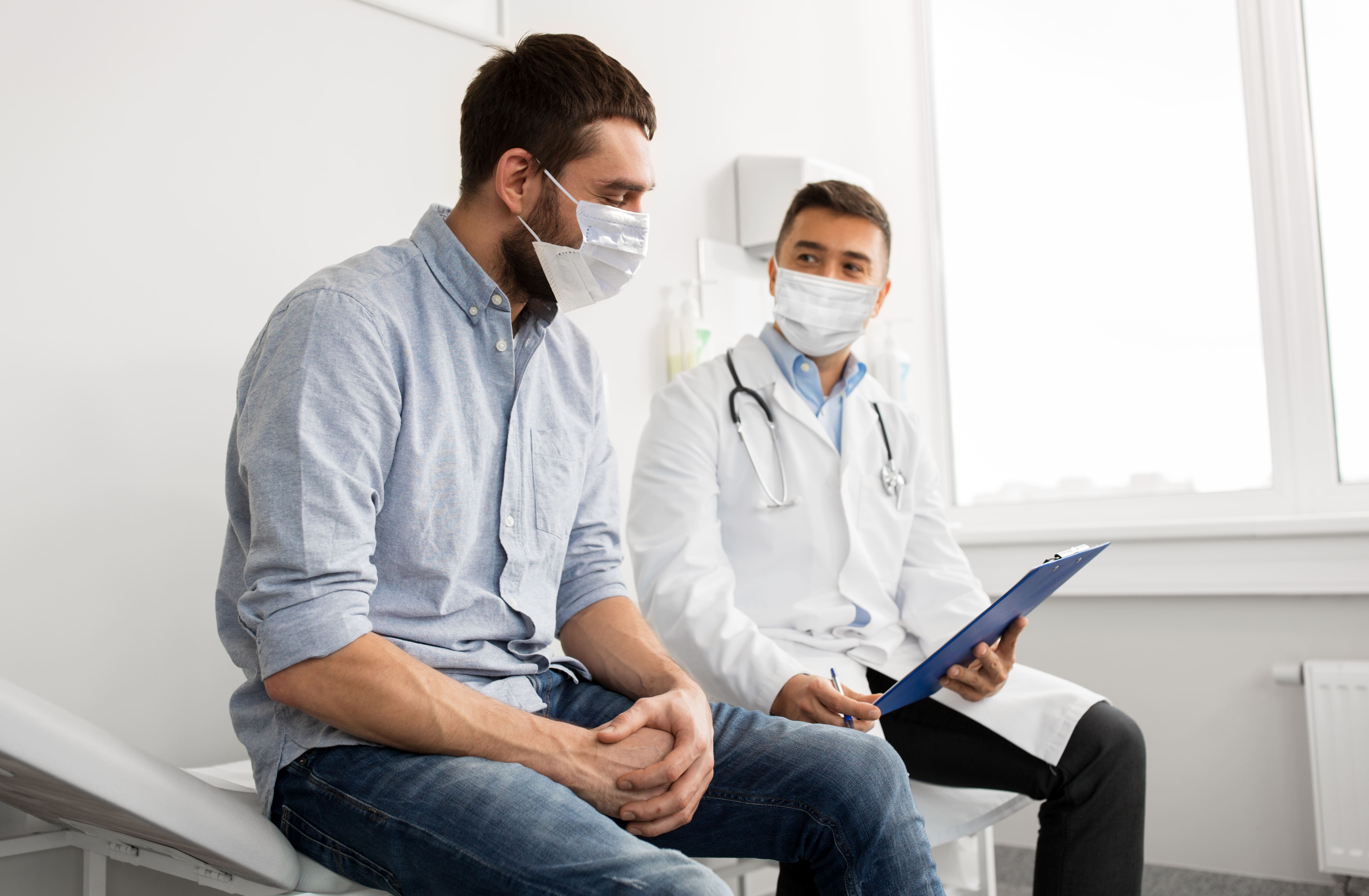 Man speaking with his doctor