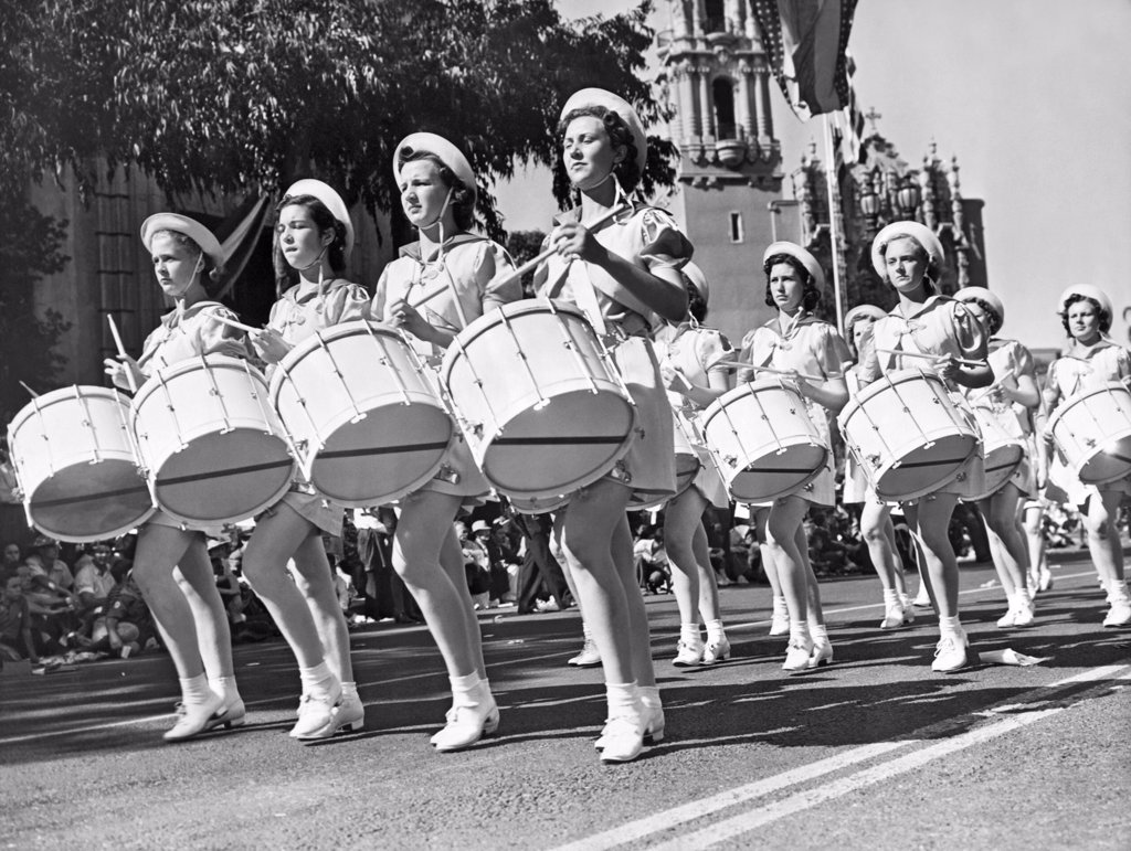 MEMBERS OF THE SOUTHERN UTAH GIRLS' DRUM AND BUGLE CORPS AS THEY MARCH IN THE 1938 ANNUAL AMERICAN LEGION PARADE.