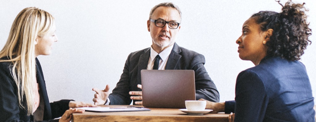 photo of accounting-professionals-advising-a-business-owner