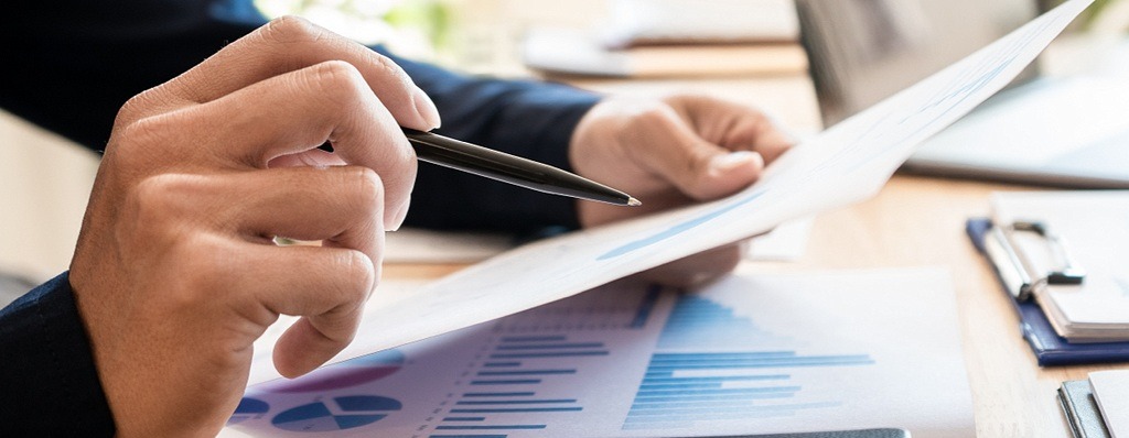 A photo of a professional looking at a SALT report