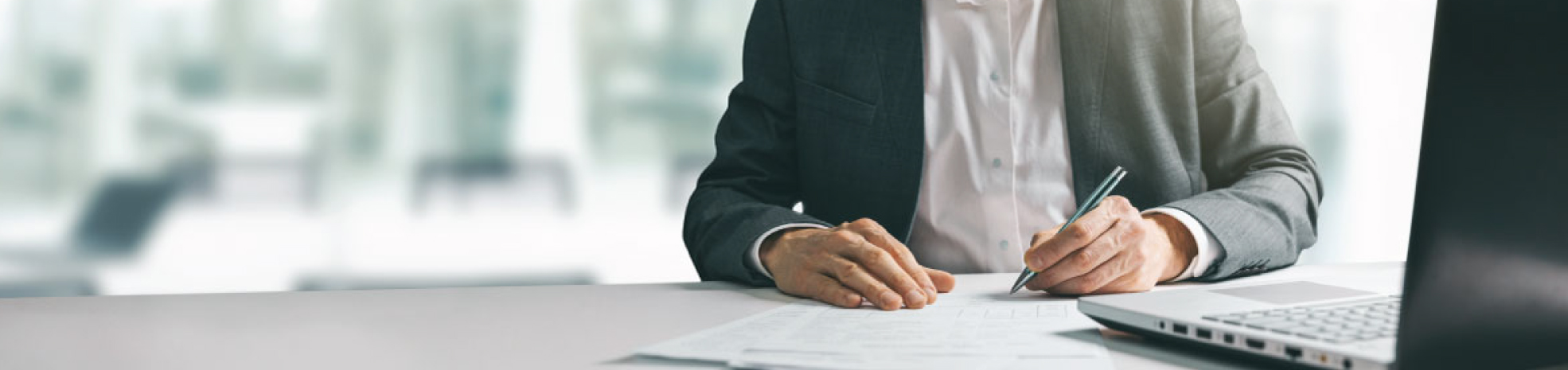 accountant sitting at his computer