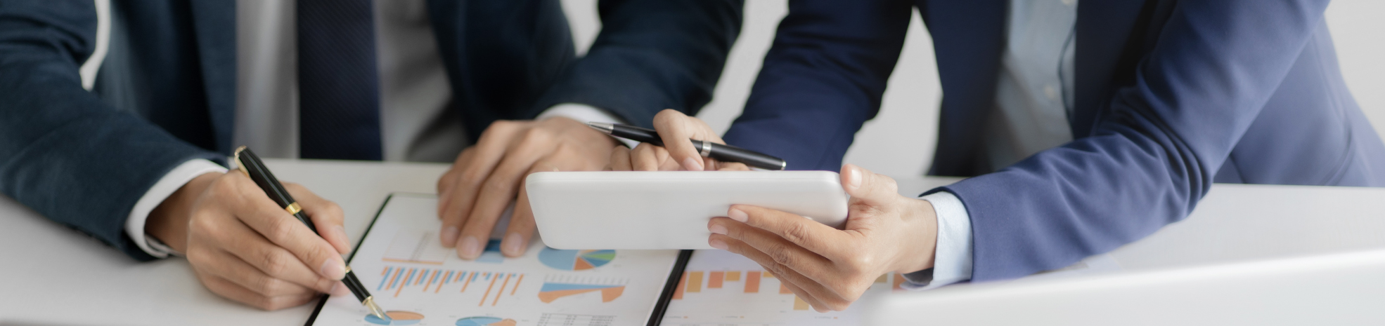 photo-of-Accountants-working-on-a-financial-statement-audit