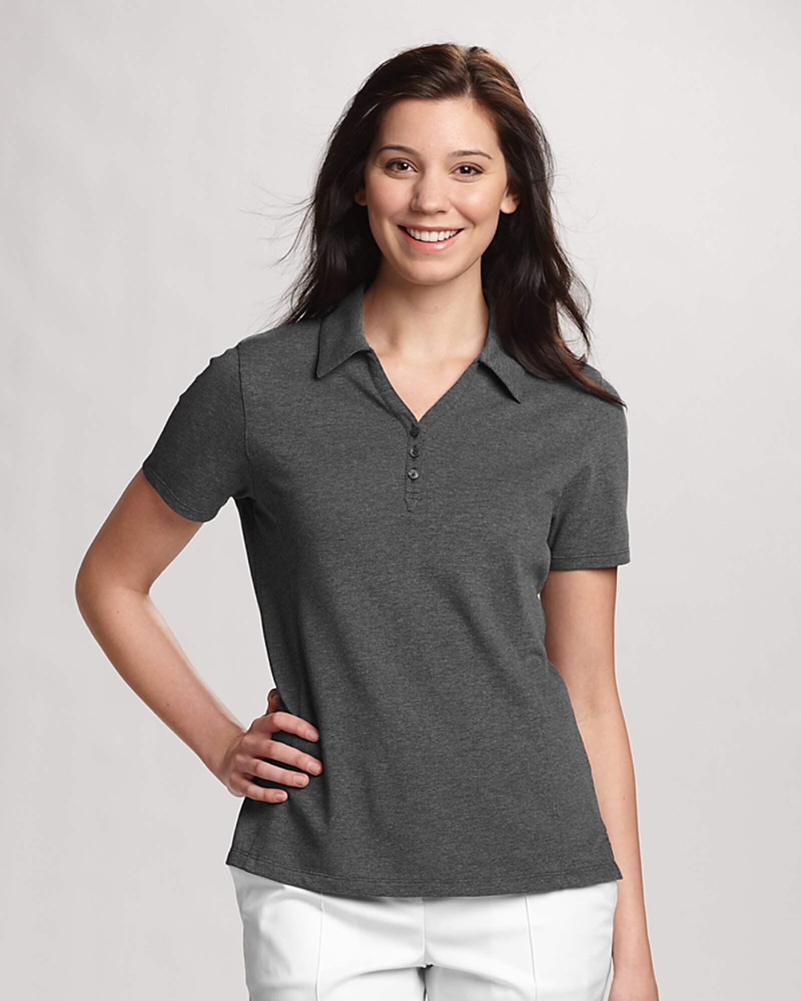 Woman wearing grey Cutter & Buck Ladies Championship Polo with her hand on her hip