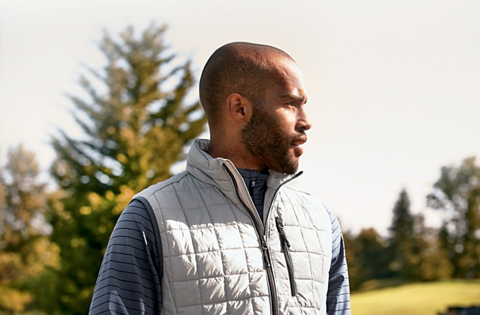 Man wearing Cutter and Buck Men's Rainier Vest