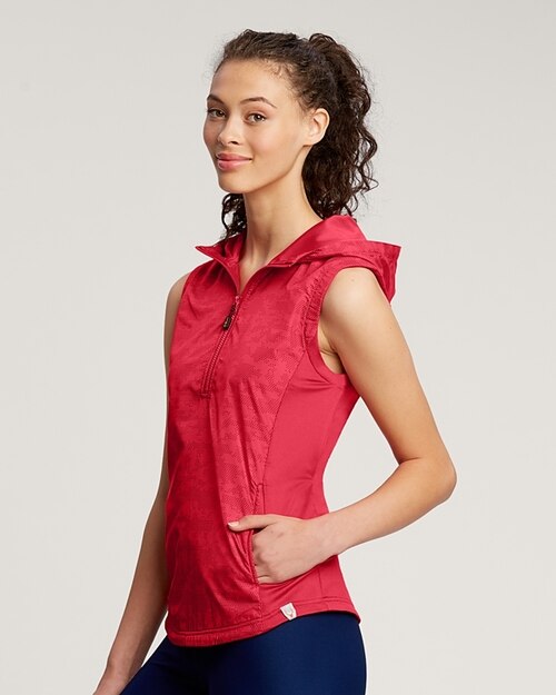 woman wearing Cutter and Buck Women's Swish Printed Sport Vest in Red