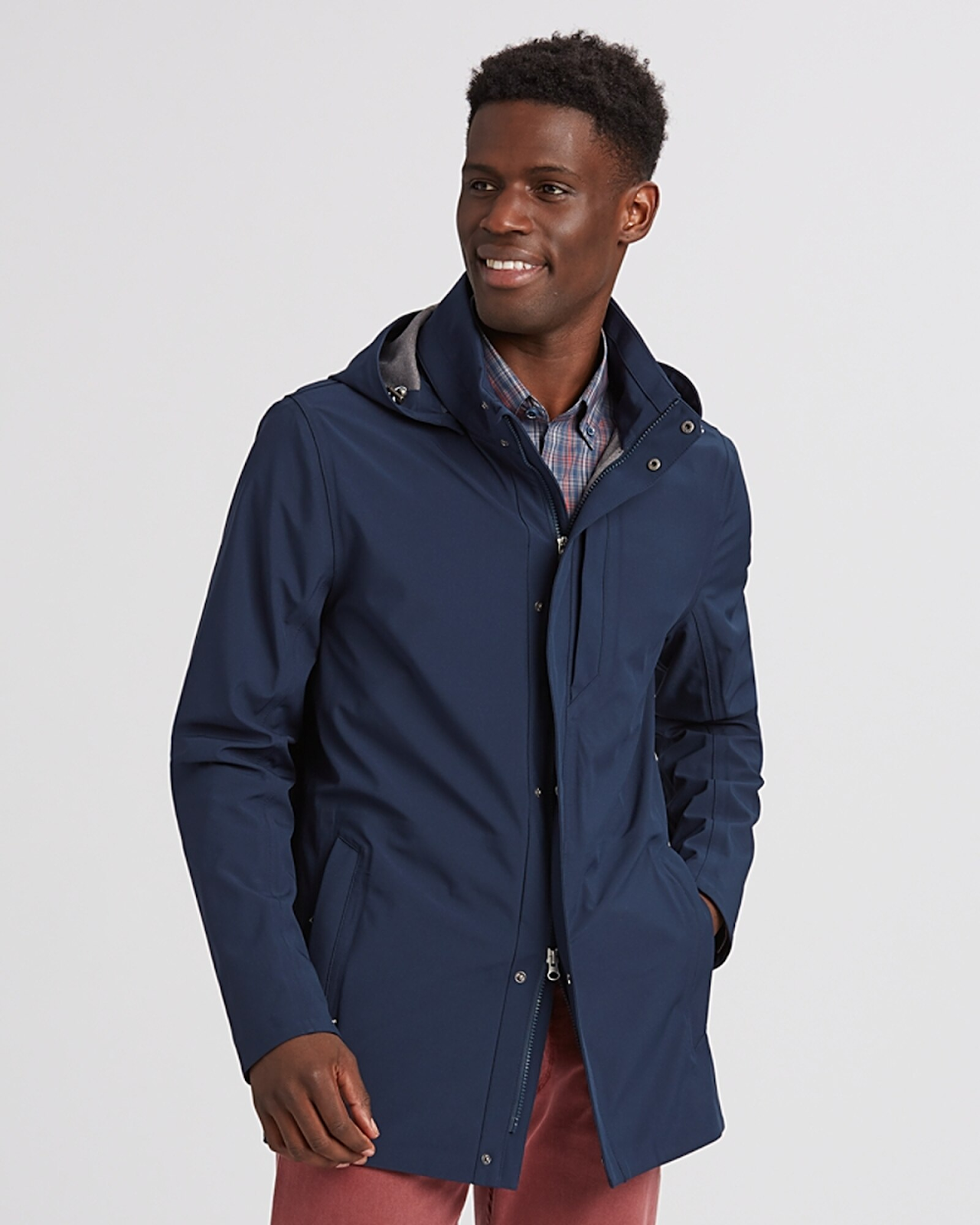 Man wearing Cutter and Buck Men's Shield Hooded Jacket