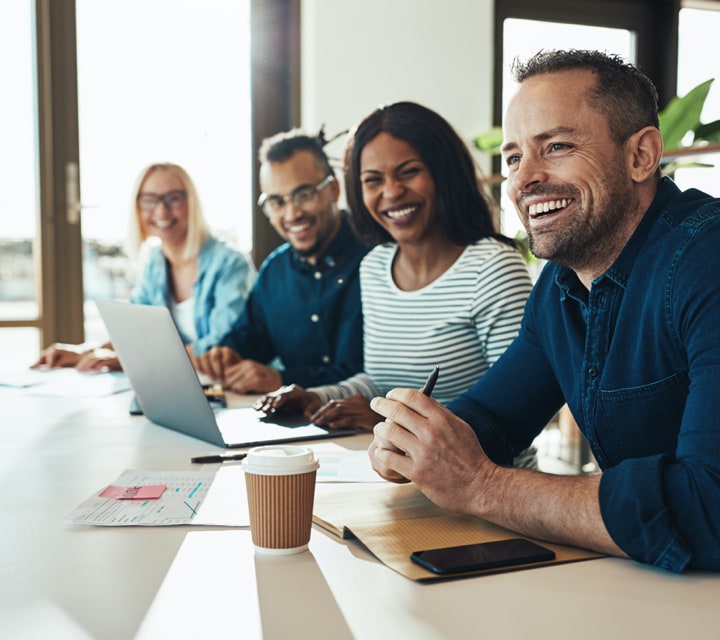 smiling-group-at-office