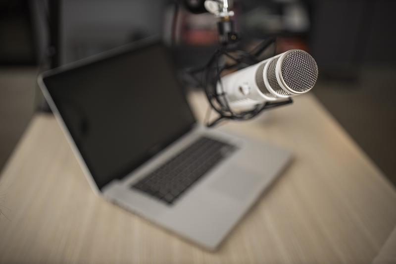 high-angle-of-radio-microphone-and-laptop