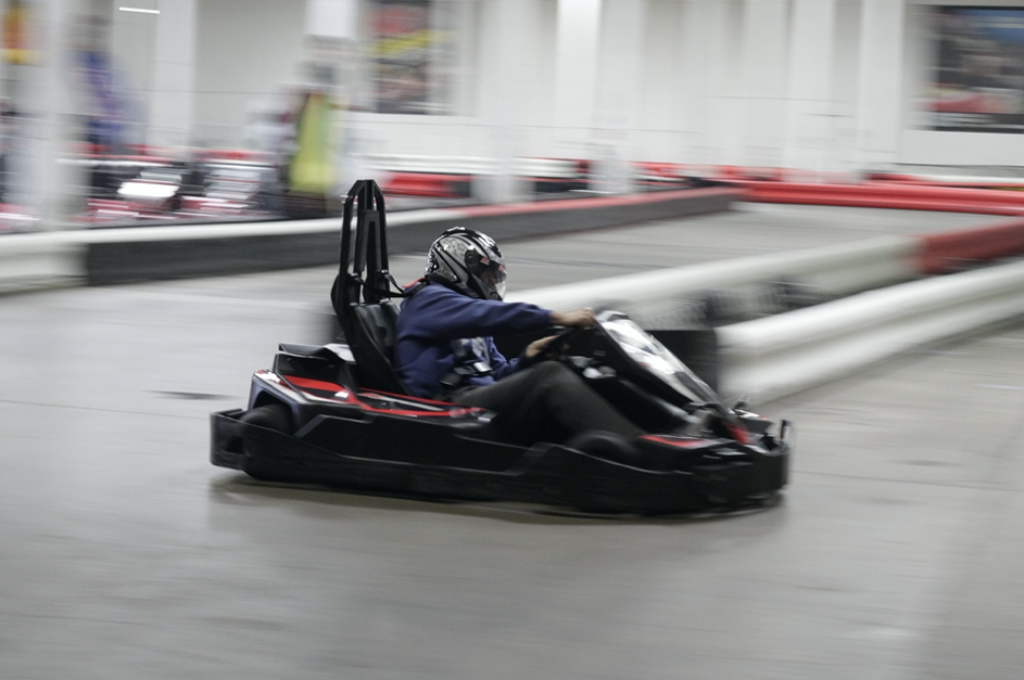 colleagues going go carting as a winter team building activity 