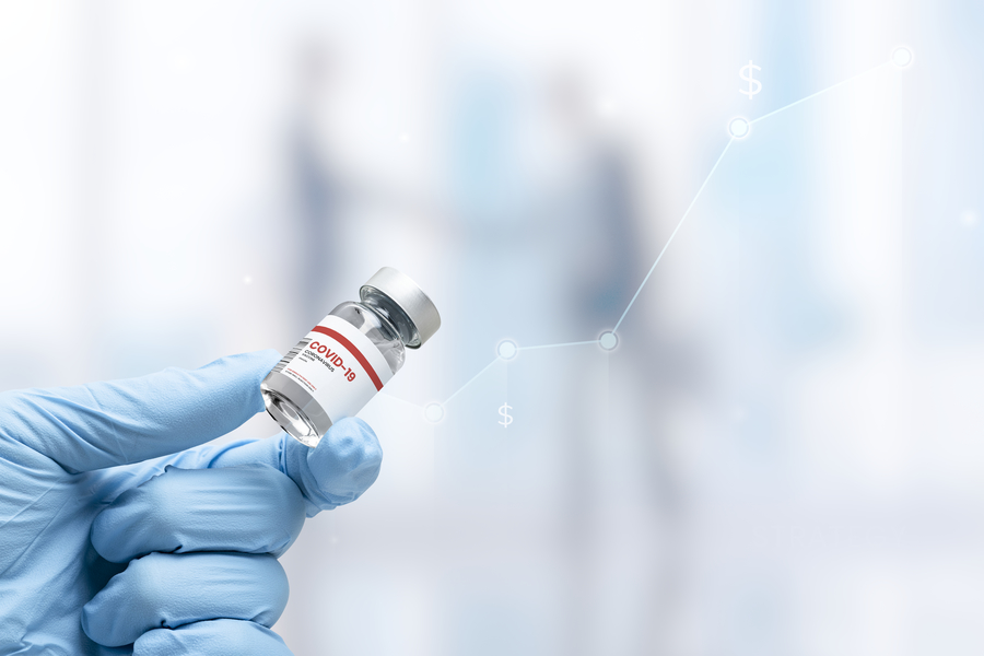 hand-in-medical-glove-holding-vaccine-vial