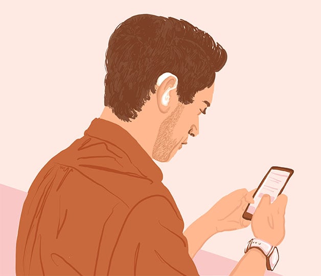 Man with hearing aid on smartphone