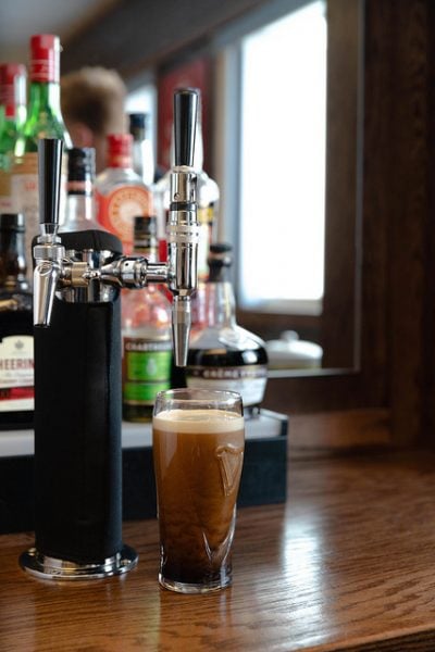 Let the beer surge, or cascade. According to Guinness, this process takes exactly 1 minute and 32.5 seconds.