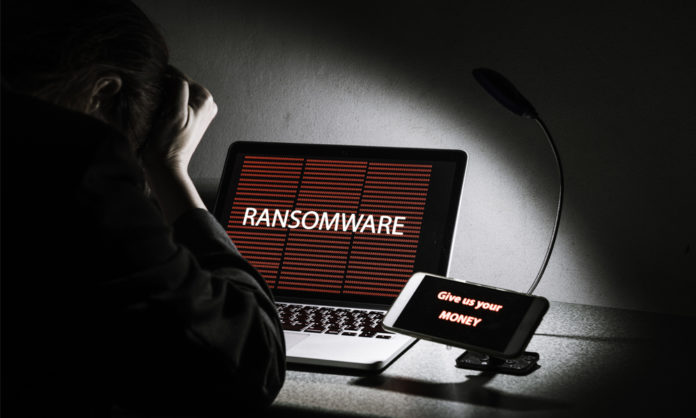 ransomware-payment-with-man-dark-area