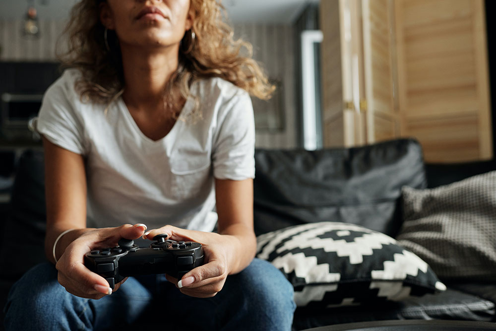 photo-of-woman-using-game-controller-4101334