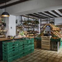 Point of sale with Valais specialities such as vegetables, fruit, cheese and meat