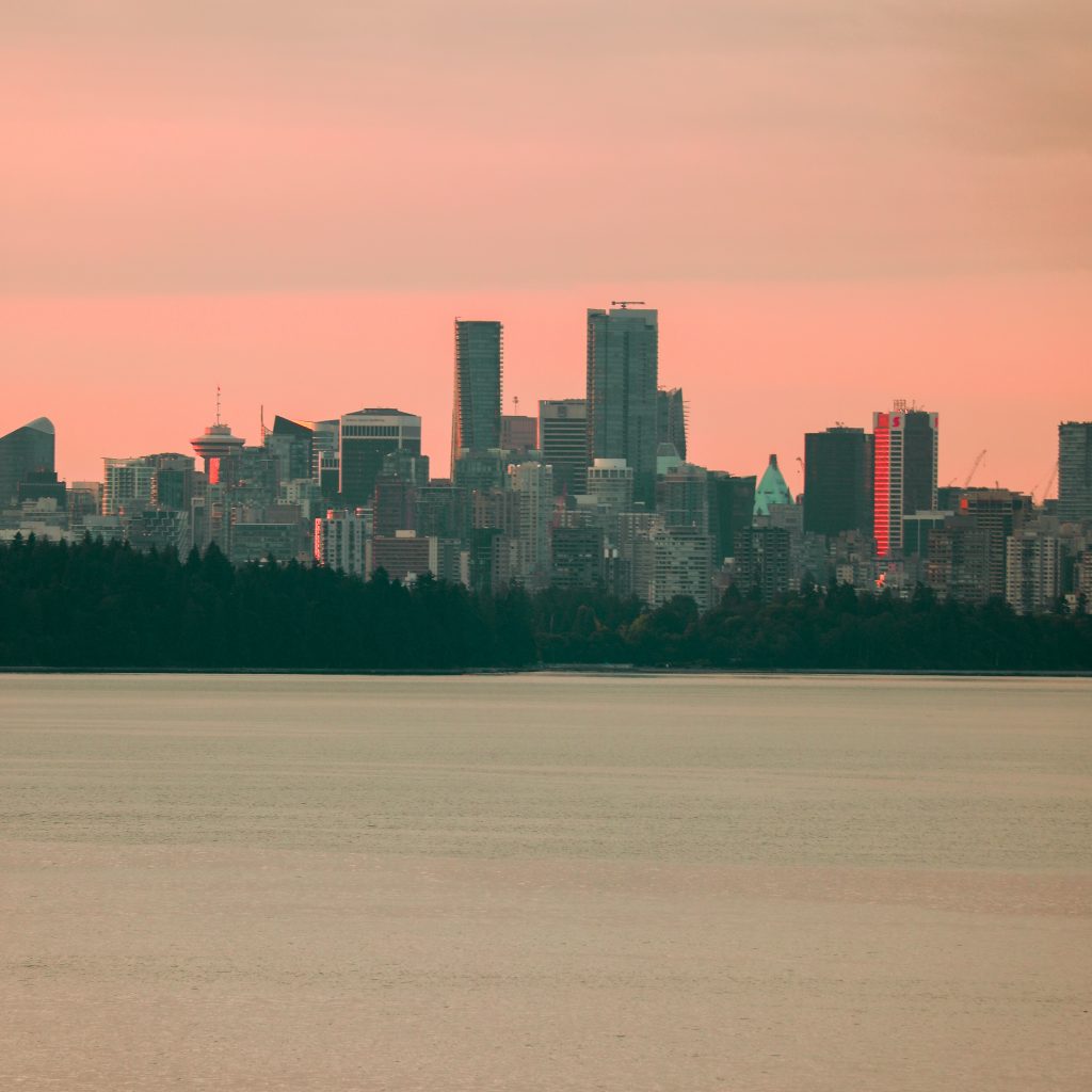 The beautiful metropolitan city of Vancouver as seen at sunrise from Lighthouse Park located in western part of the city