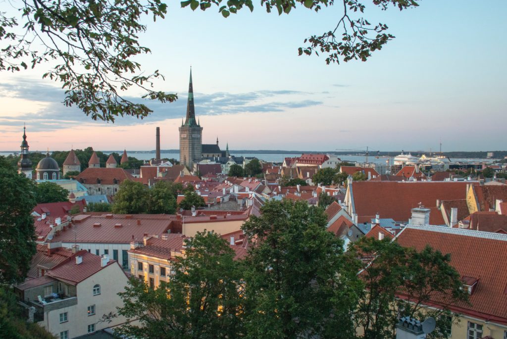 a shot of a city in Estonia, with houses and a cathedral a great place for spring 2021