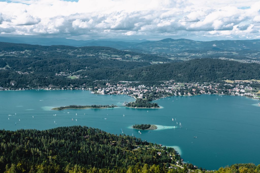 Region Carinthia in Austria with a wide river and lake and a small town