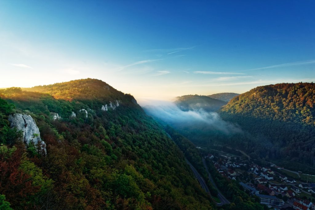 Mountains with fog and small clouds Destinations in Germany for Autumn 2020