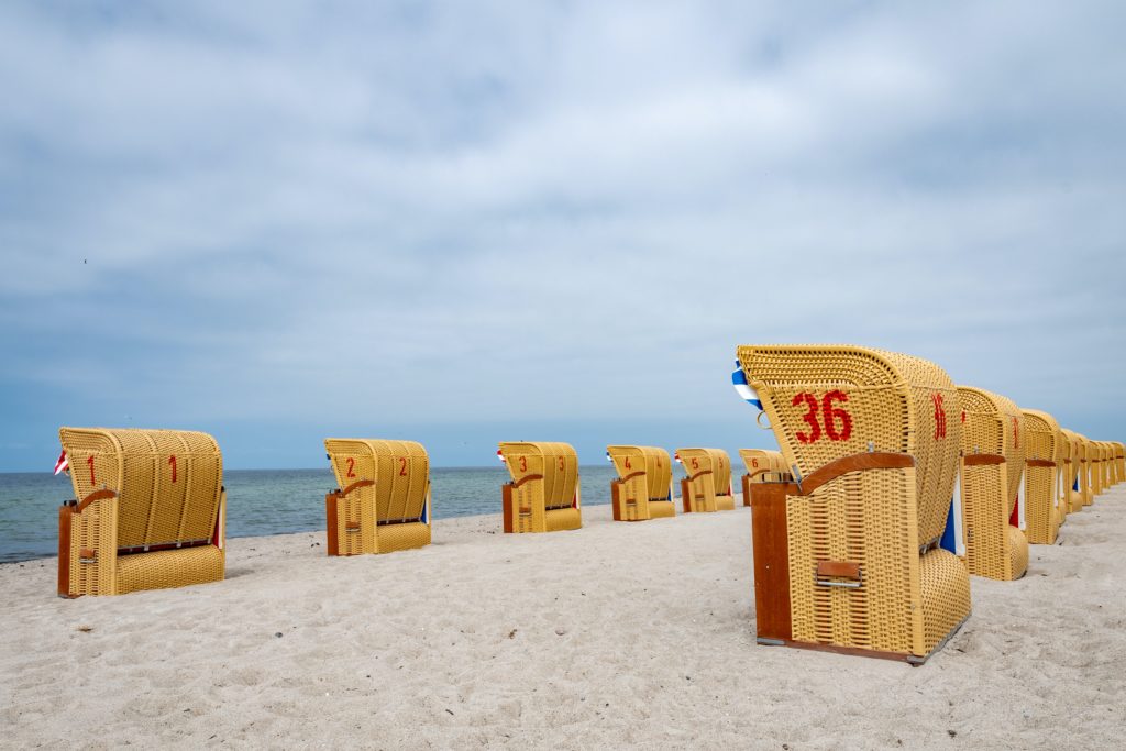Beach chairs on the coast of the North Sea in Schleswig Holstein Destinations in Germany for Autumn 2020