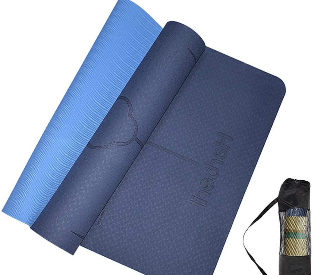 A blue yoga mat with a bag. 