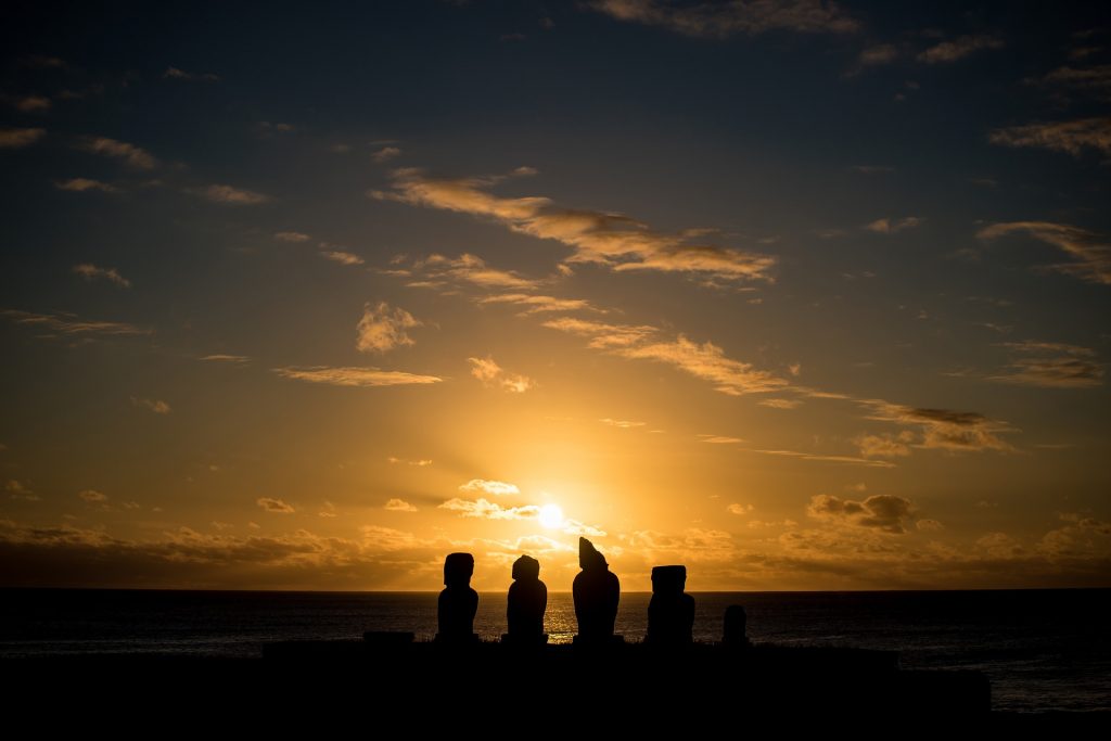 The magnificent Rapa Nui statues at sunset
