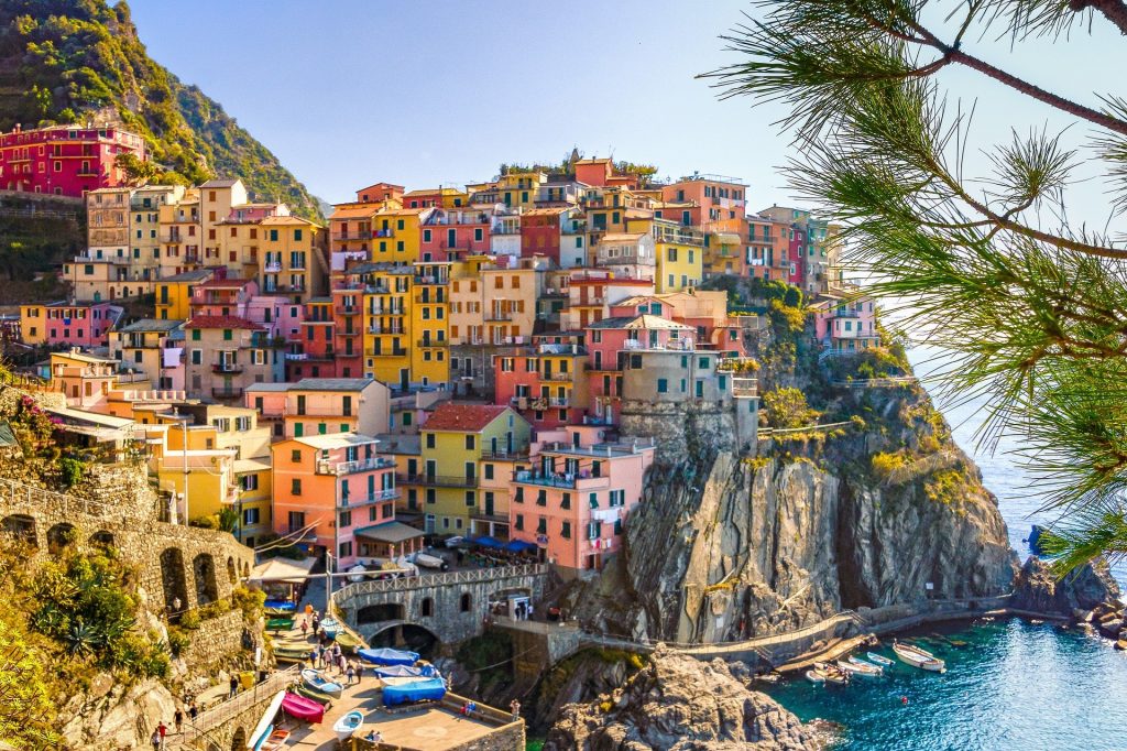Pretend you're by the colorful houses of Italy on your alternative spring break vacation