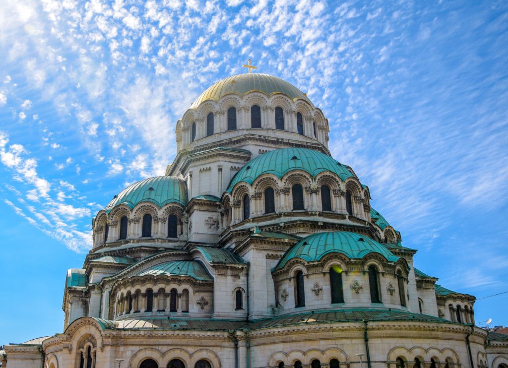 A beautiful cathedral and a bright blue sky in Sofia as one of the cheapest New Year destinations