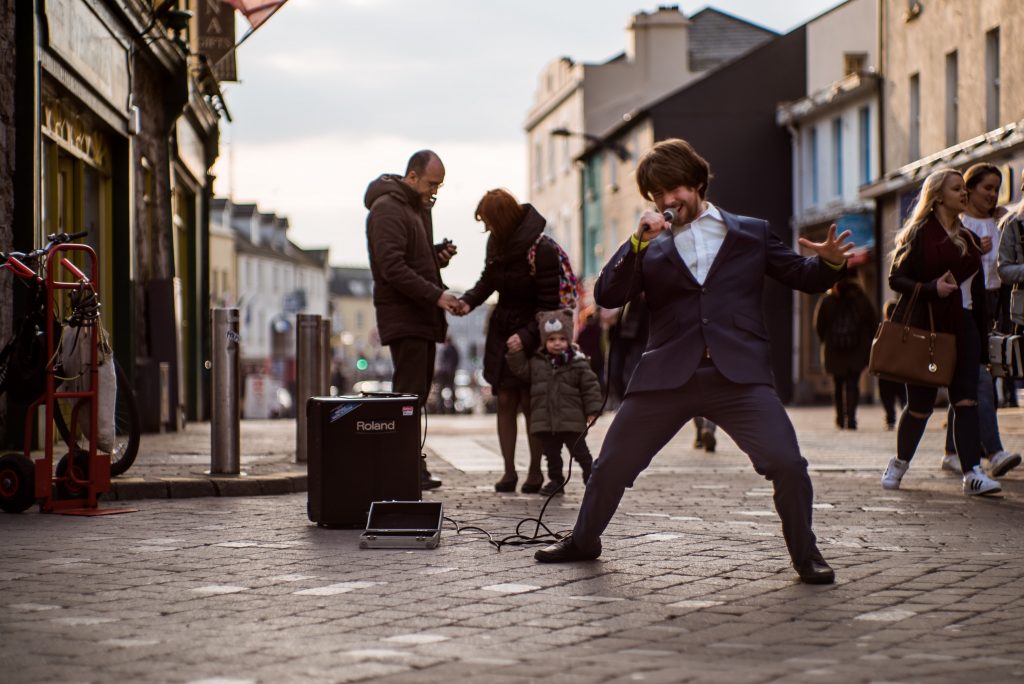 A man singing in the street of Galway, Ireland.