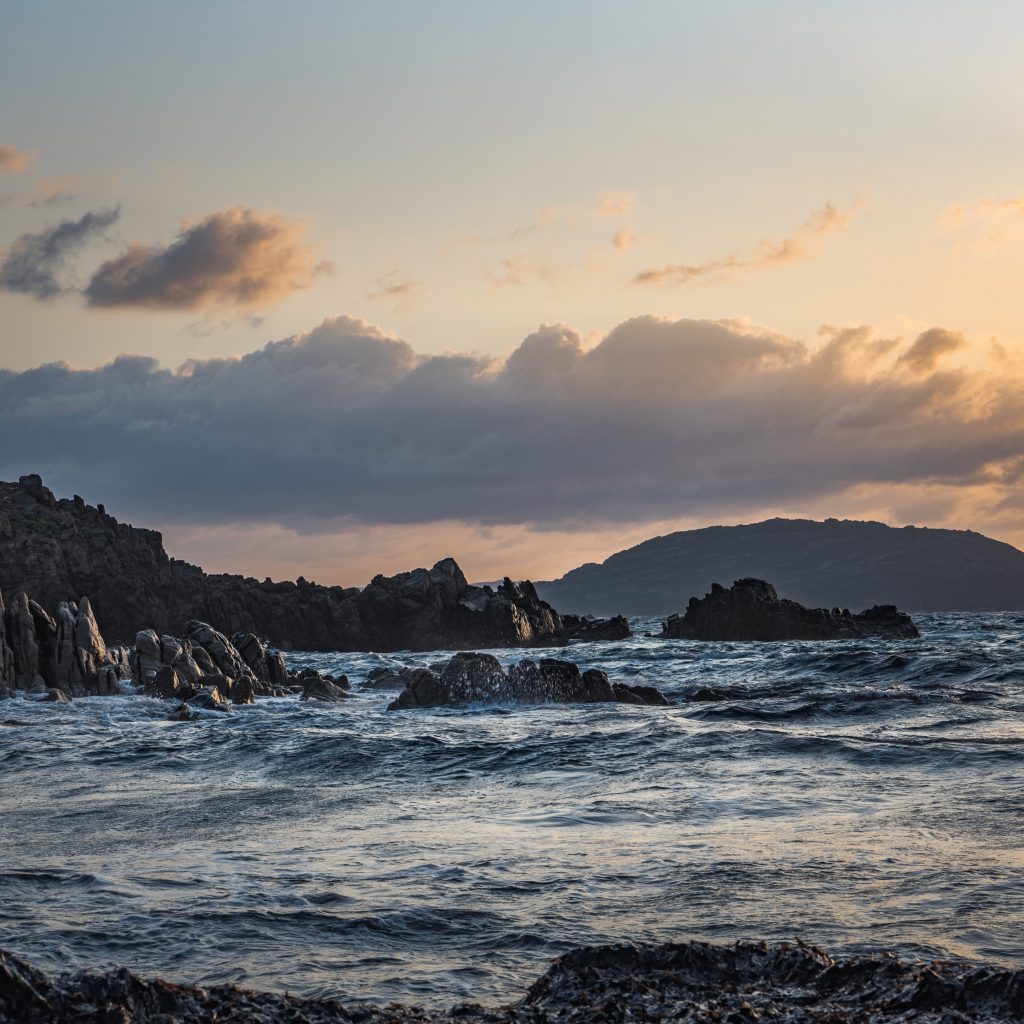 The beautiful La Maddalena archipelago in Sardinia at sunset by the beach