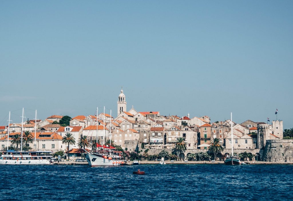 The city of Korcula by the seaside.