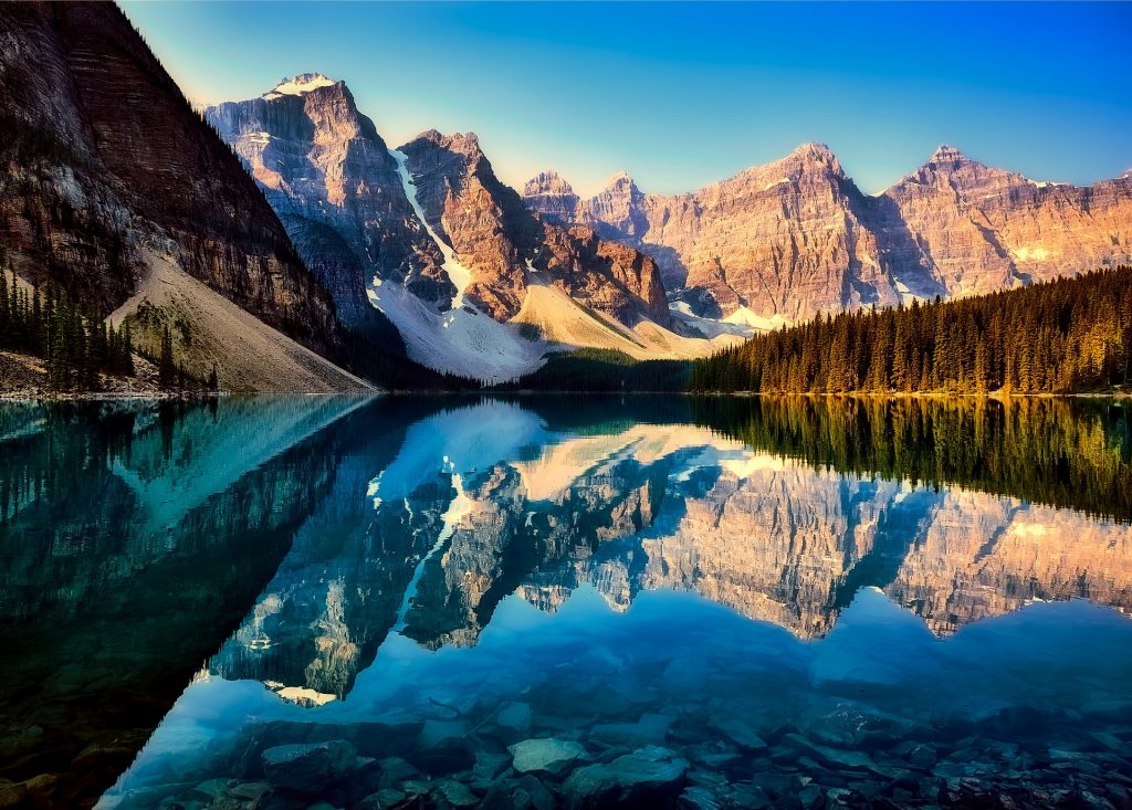 Mountains by a lake in Western Canada, one of the best travel destinations in the world