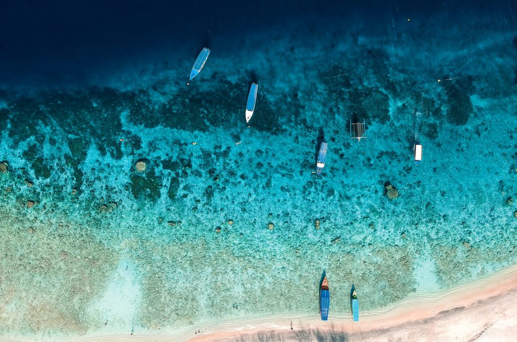 Gili Trawangan island with turquoise blue water.