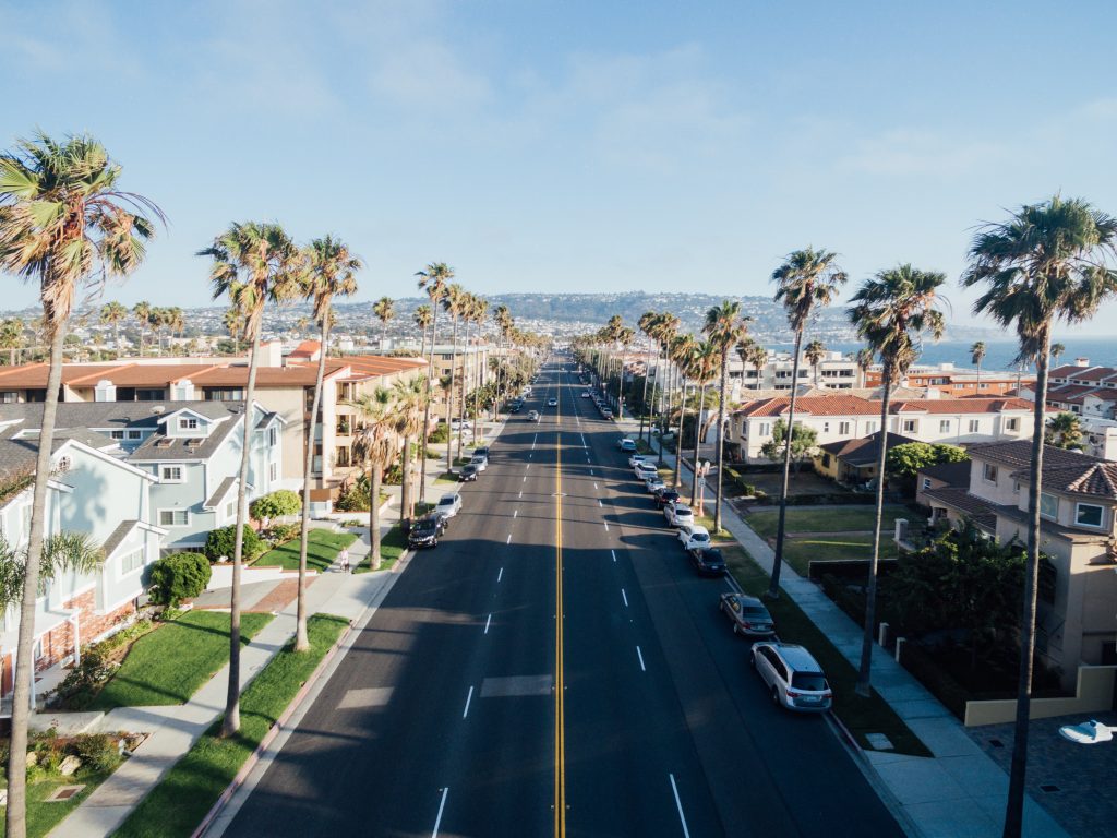 A street lined with palm trees in the city of California, where Neil Armstrong once lived and studied