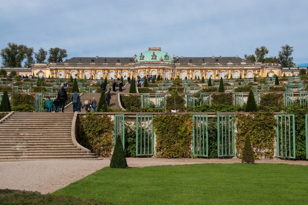 a beautiful palace located in Brandenburg called Sanssouci Palace