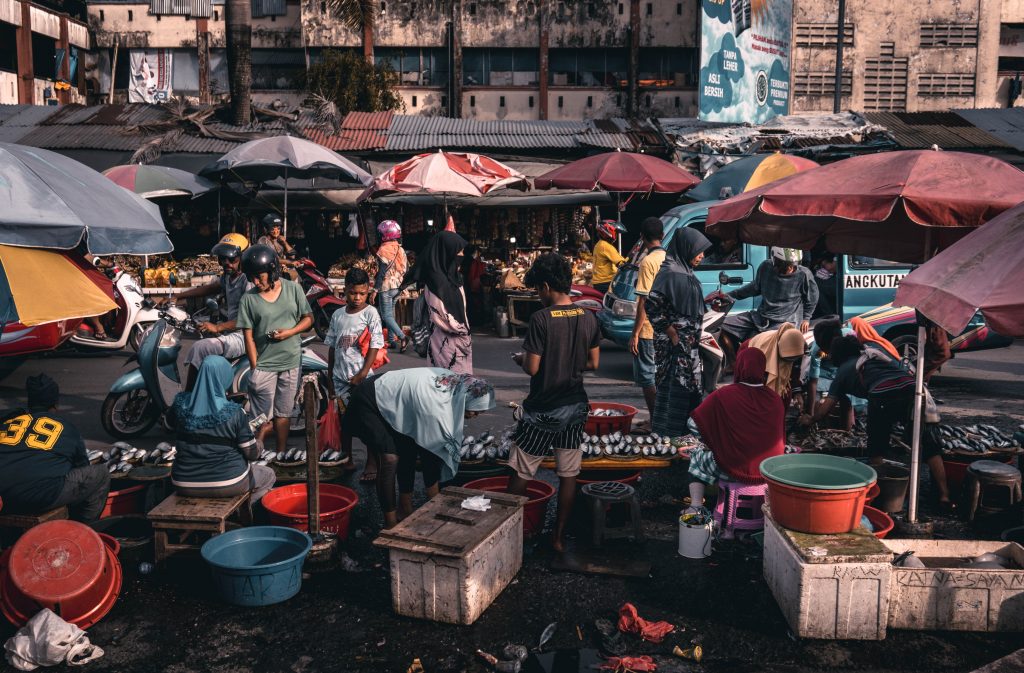 Bustling local markets with people