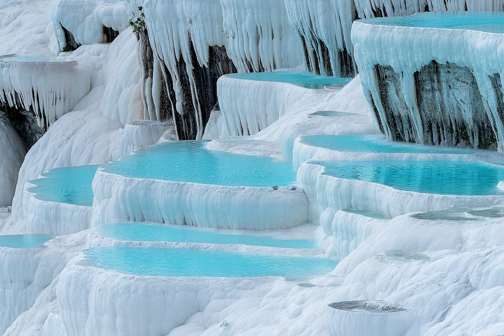 Pamukkale in Turkey with thermal blue pools is one of the most beautiful places in the world.
