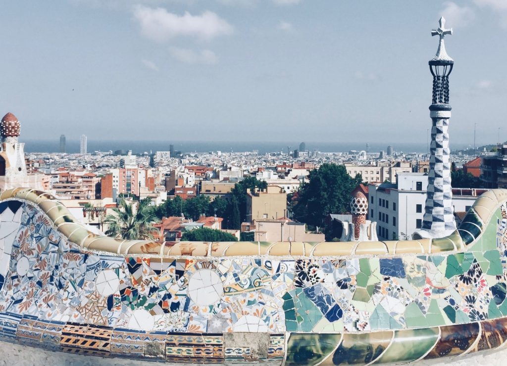 A picture of the city of Barcelona with a colorful mural. 