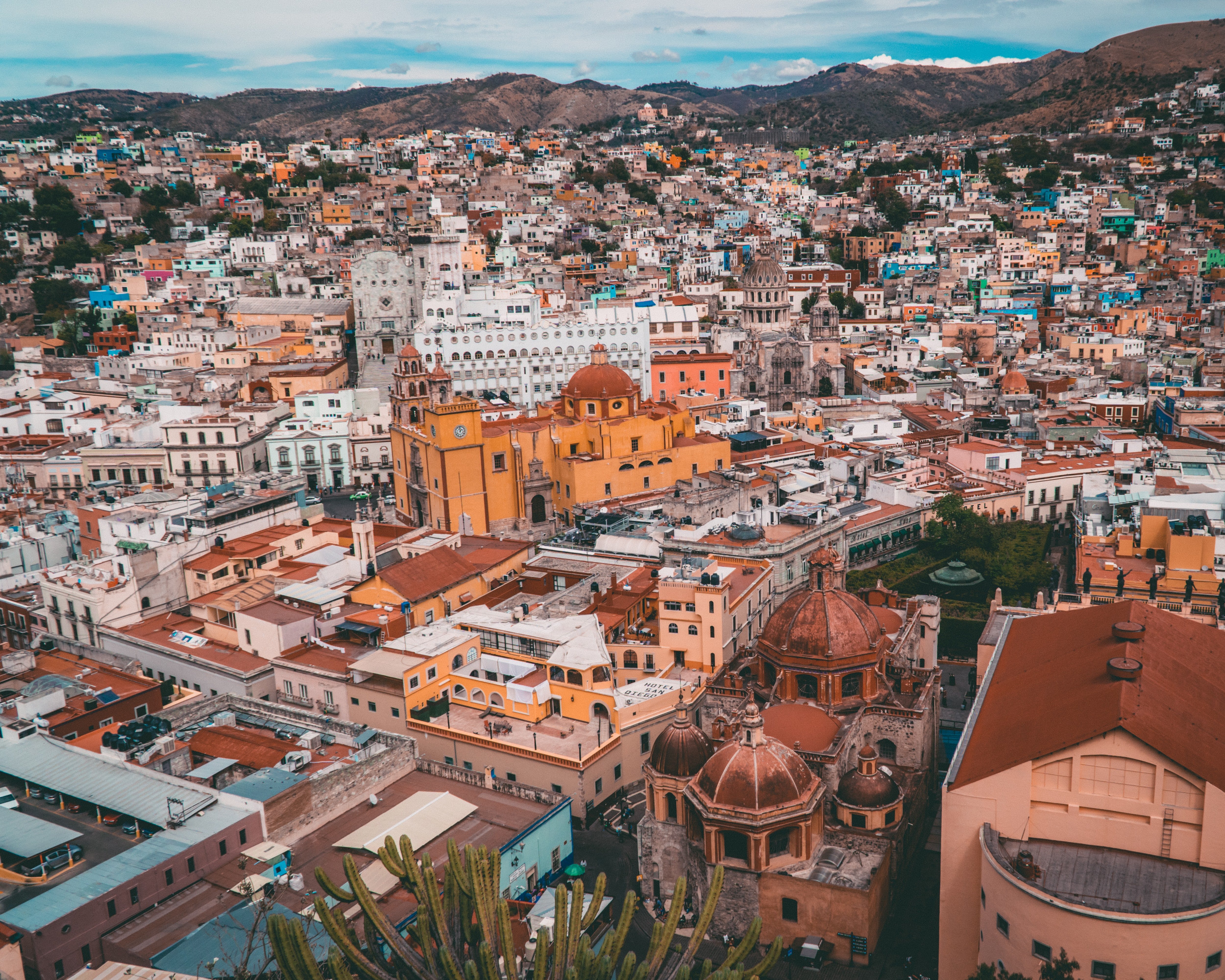 A city view of Mexico with orange buildings.