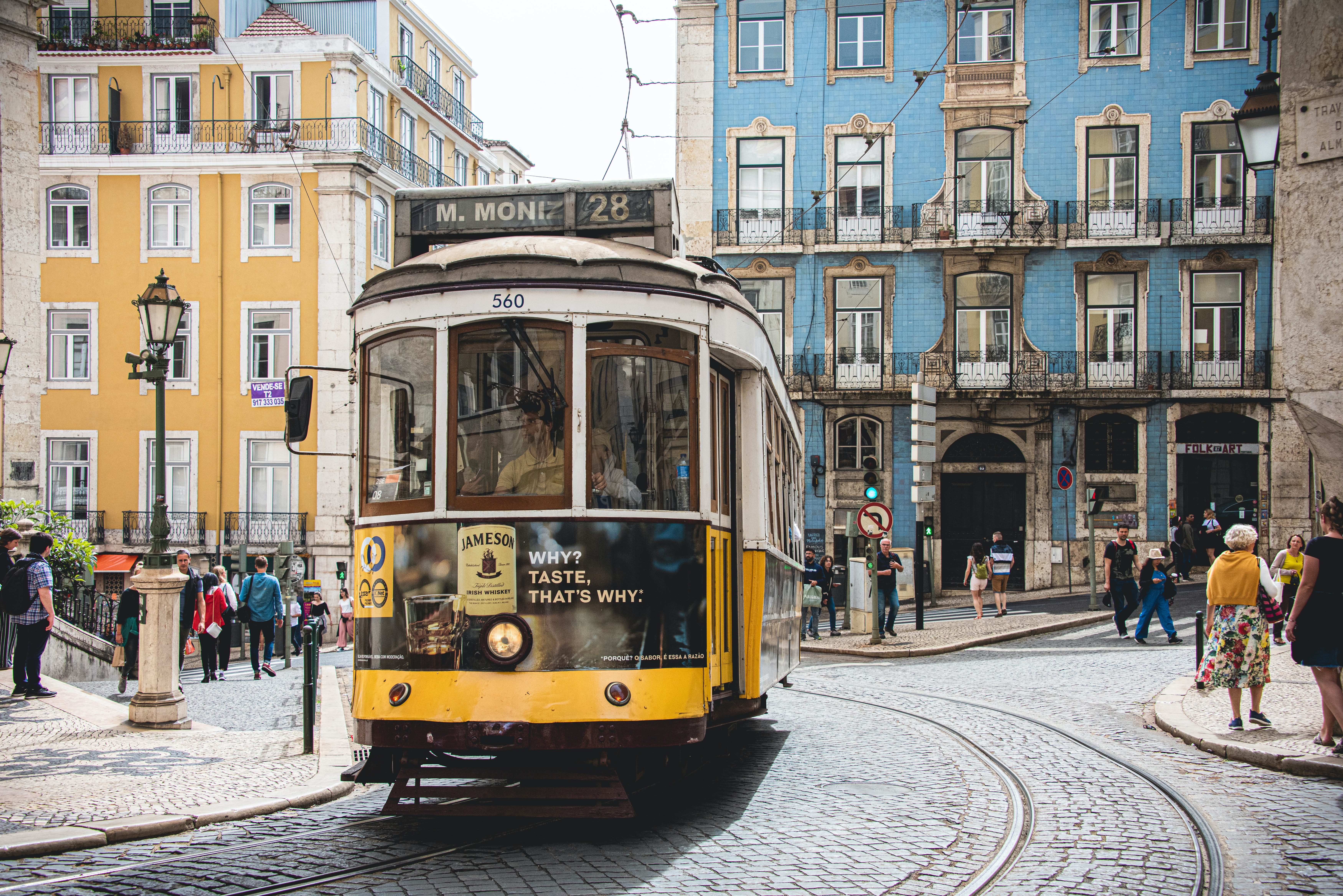 A old tram in the colorful streets of Portugal