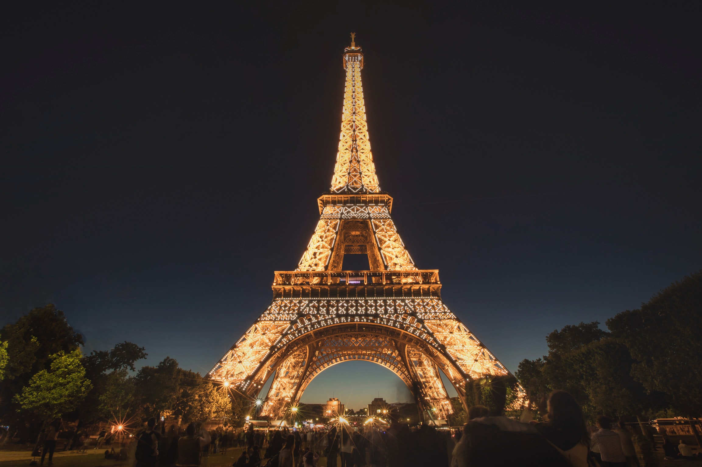 The Eiffel Tower at nightfall against the sky
